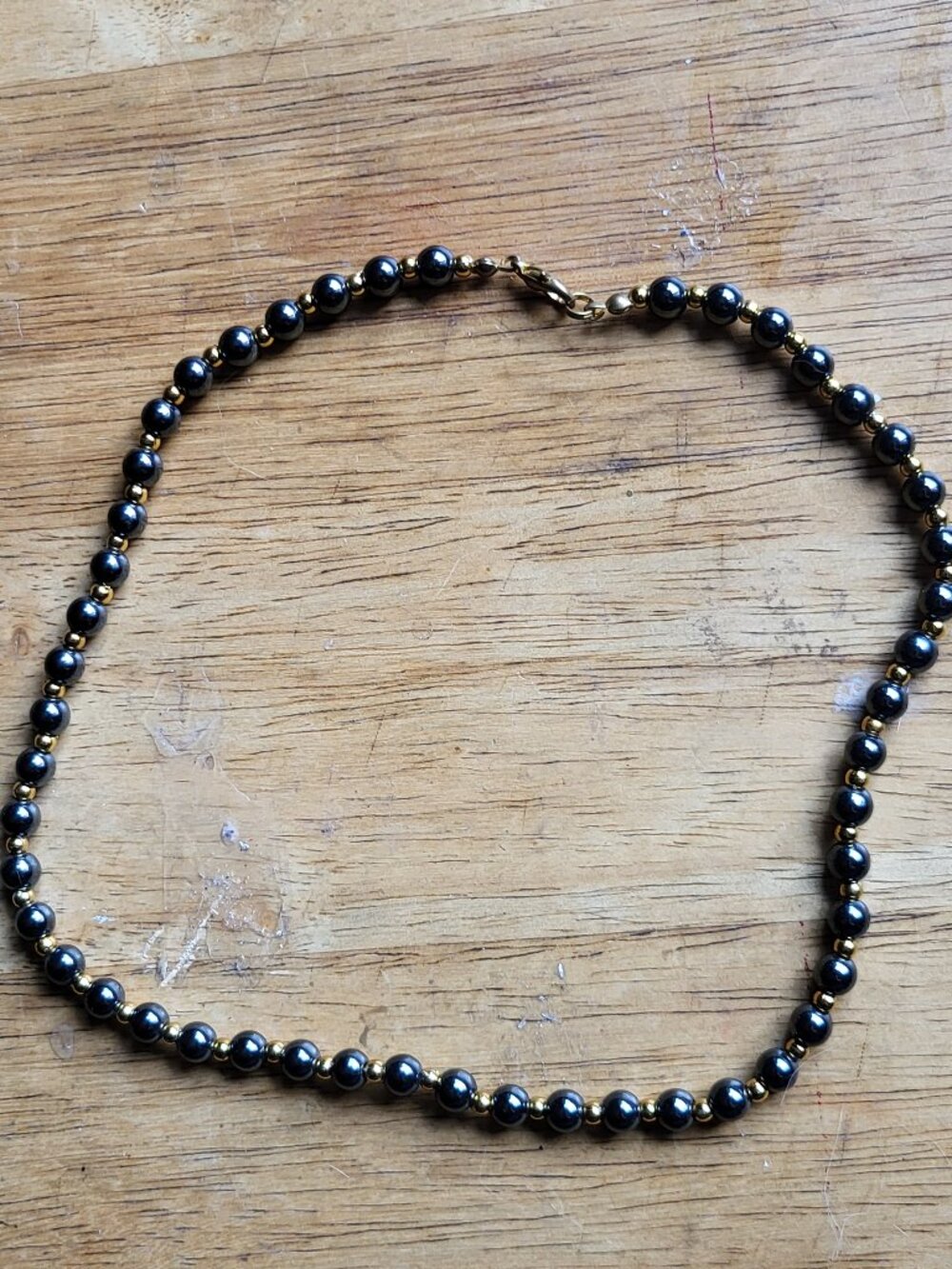 VINTAGE BLACK HEMATITE AND GOLD PLATED SPACER BEADED NECKLACE 17"